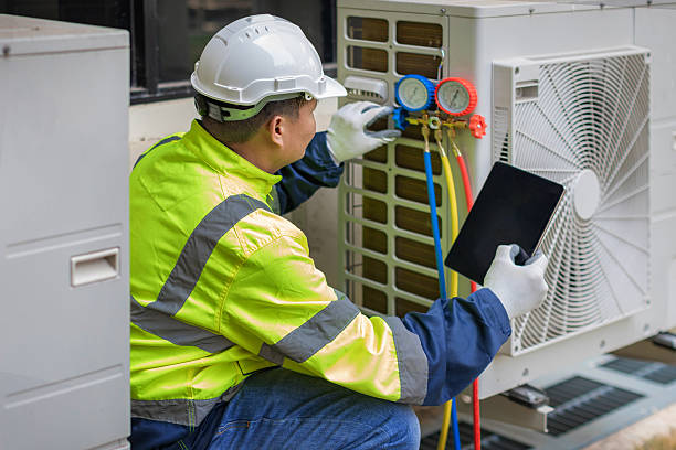 Professional Hvac technician working in Prides Crossing, MA
